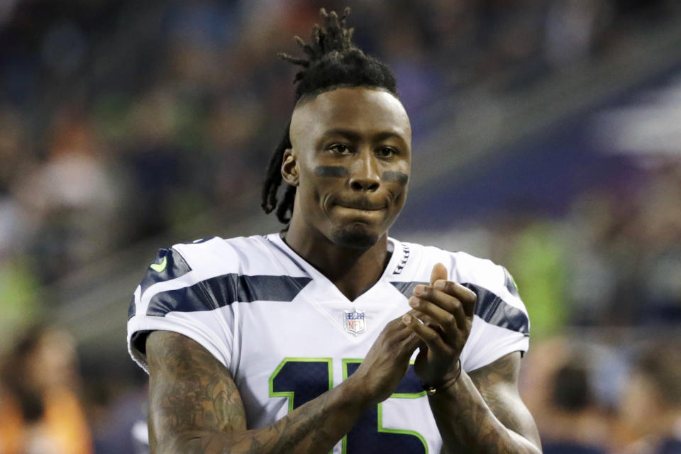 FILE - In this Sept. 17, 2018, file photo, Seattle Seahawks wide receiver Brandon Marshall gestures before the team's NFL football game against the Chicago Bears in Chicago. Marshall’s transition to life after football following the 2018 season has gone smoothly. But none of it would be possible if Marshall hadn’t realized he needed help nearly a decade ago to deal with isolation and bouts of depression. (AP Photo/David Banks, File)