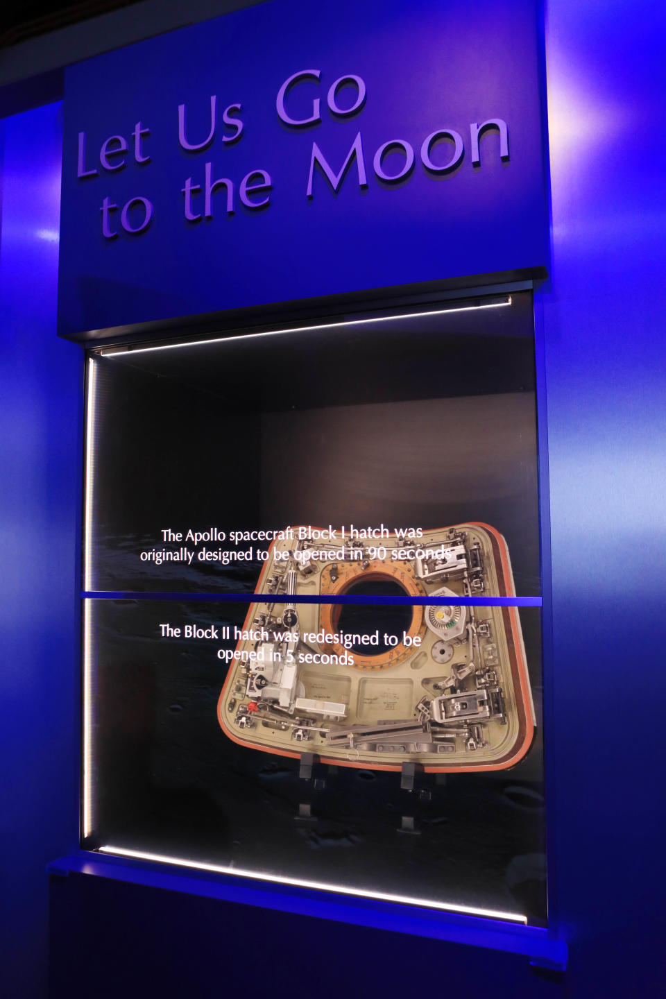 This Tuesday, Jan. 24, 2017 photo provided by NASA shows the Apollo 1 capsule hatch on display in an exhibit at the Kennedy Space Center in Titusville, Fla. On Jan. 27, 1967, a fire during a test on the launch pad killed three astronauts at the start of the Apollo moon program. (Kim Shiflett/NASA via AP)