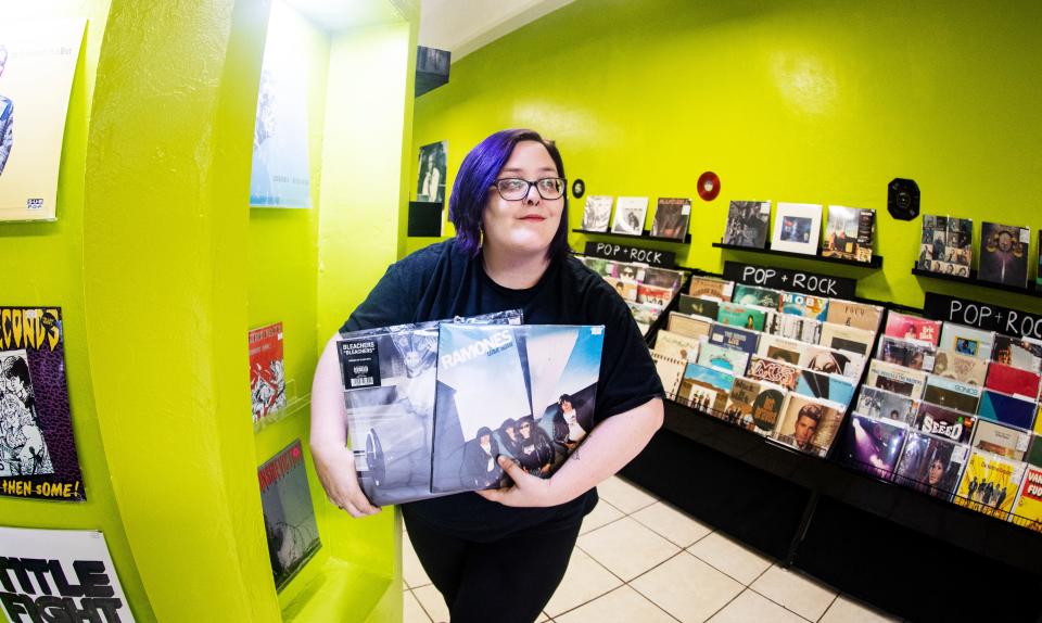 Liz Cochran, the owner of Stellar Records in Fort Myers stands for a portrait on Thursday, April 11, 2024. The store sells new and vintage vinyl records, cassette tapes, vintage decor and more. The store will take part in Record Store Day, where U.S. record stores sell cool, limited-edition vinyl records. The event is on April 20.