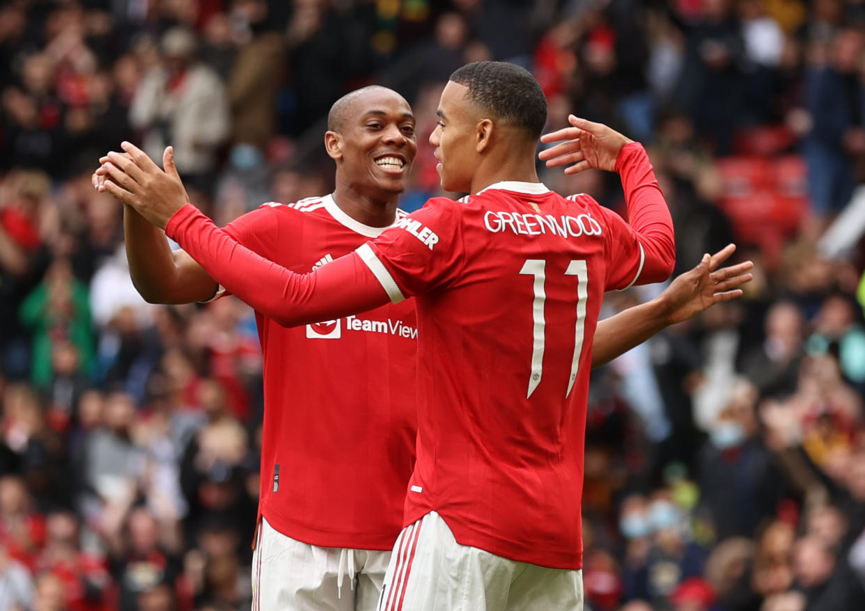 Manchester United's Mason Greenwood (right) celebrates scoring with Anthony Martial in a pre-season friendly against Everton.