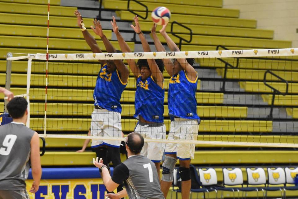 Three Fort Valley State men’s volleyball players leap to block the ball during a game against Tusculum in February of 2023. FVSU will host their conference tournament for the first time this week.