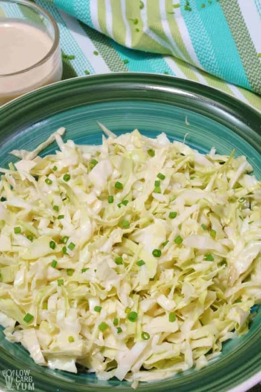 <p>Low Carb Yum</p><p>This keto coleslaw is made with a creamy, sugar-free dressing for a delicious cabbage salad you can enjoy all summer! Plus, you only need 5 ingredients and about 5 minutes to make it.</p><p><strong>Get the recipe: </strong><a href="https://lowcarbyum.com/quick-cabbage-coleslaw/" rel="nofollow noopener" target="_blank" data-ylk="slk:Easy Keto Coleslaw;elm:context_link;itc:0;sec:content-canvas" class="link "><strong>Easy Keto Coleslaw</strong></a></p>