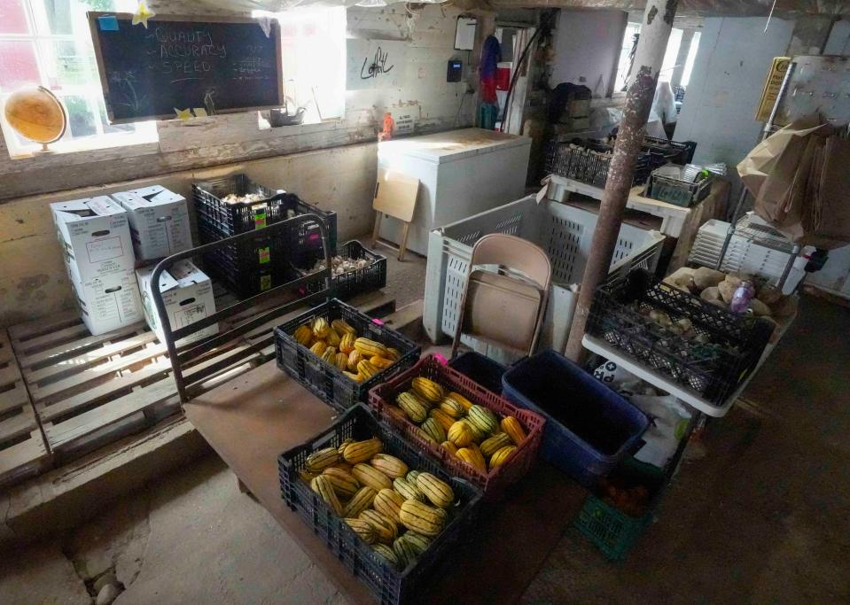 Produce is packed in crates in a building at LotFotL Community Farm in Elkhorn on Oct. 5, 2023. The farm offers both summer and winter CSAs to customers in the Milwaukee area.
