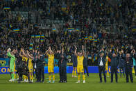 Ukraine players celebrate at the end of the Euro 2024 qualifying play-off soccer match between Ukraine and Iceland, at the Tarczynski Arena Wroclaw in Wroclaw, Poland, Tuesday, March 26, 2024. (AP Photo/Czarek Sokolowski)