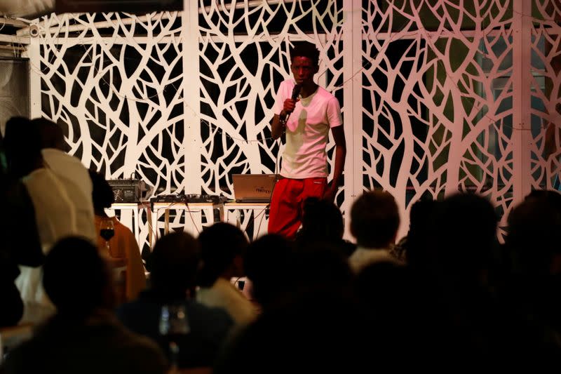 Kenyan standup comedian Brian Onjoro performs during his show at the Kez's Kitchen restaurant in Nairobi