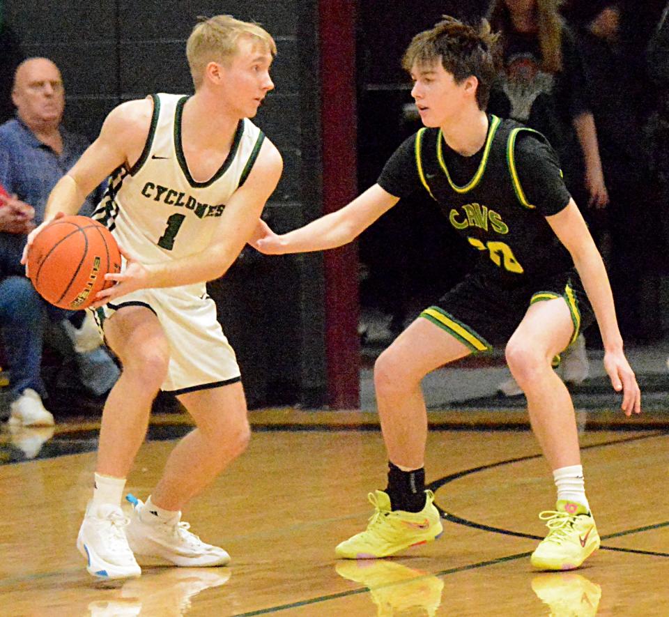 Clark-Willow Lake's Trey Huber is defended by Aberdeen Roncalli's Aiden Fisher during their Northeast Conference high school basketball doubleheader on Thursday, Jan. 19, 2023 in Clark.