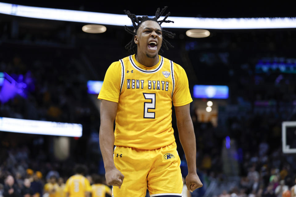 Kent State guard Malique Jacobs celebrates during the second half of an NCAA college basketball game against Toledo for the championship of the Mid-American Conference Tournament, Saturday, March 11, 2023, in Cleveland. (AP Photo/Ron Schwane)