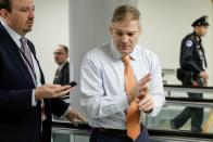 U.S. Rep. Jordan talks to reporter as Trump impeachment trial resumes on Capitol Hill in Washington