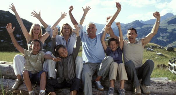 Family shouting on mountain