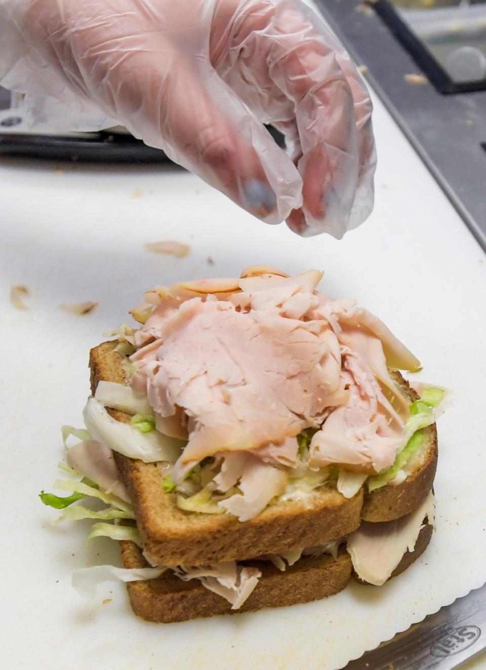 Sandwiches being made at the Bates House of Turkey restaurant, located at the Westminster Shpping Center in Montgomery, Ala, on Wednesday May 3, 2023. 