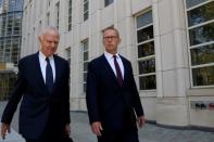 Mark Johnson, a British citizen who at the time of his arrest was HSBC's global head of foreign exchange cash trading, exits with his lawyer, Frank Wohl (L) following a hearing at the U.S. Federal Court in Brooklyn, New York, U.S., August 29, 2016. REUTERS/Brendan McDermid