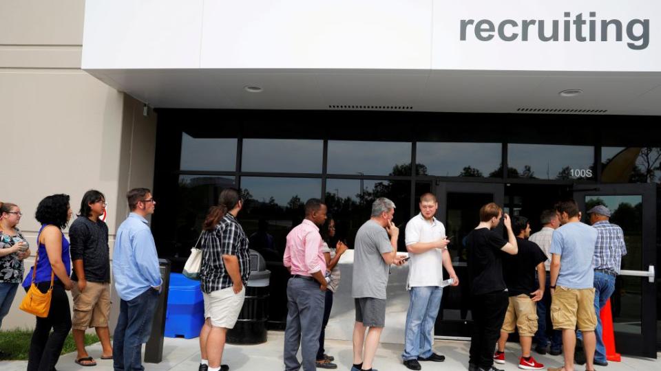 Job seekers line up to apply for jobs during "Amazon Jobs Day."