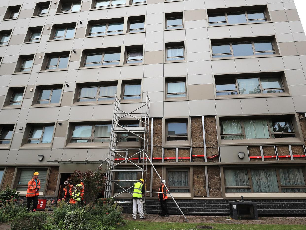 Ms May launched a ‘major national investigation’ into the use of combustible cladding on high rise buildings after the Grenfell tragedy: PA