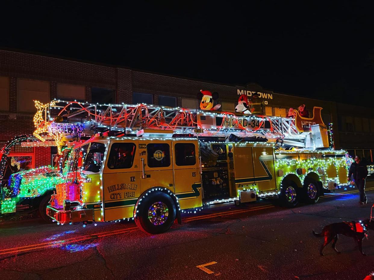 Santa arrived in an unconventional sleigh...sitting atop the Hillsdale City Fire Department's ladder truck bringing up the rear of the parade.