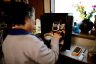 Royal aficionado Fumiko Shirataki, 78, burns an incense stick at the shrine of her late husband at her home in Kawasaki, south of Tokyo, Japan, April 11, 2019. REUTERS/Issei Kato