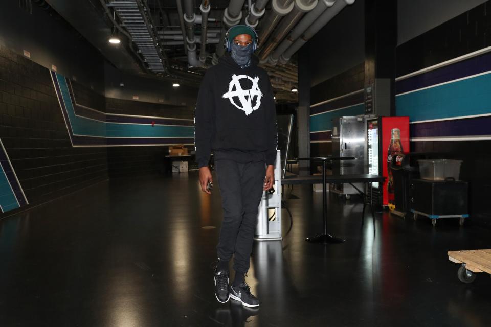 Kevin Durant of the Brooklyn Nets arrives for a game against the Charlotte Hornets in North Carolina, December 27, 2020.