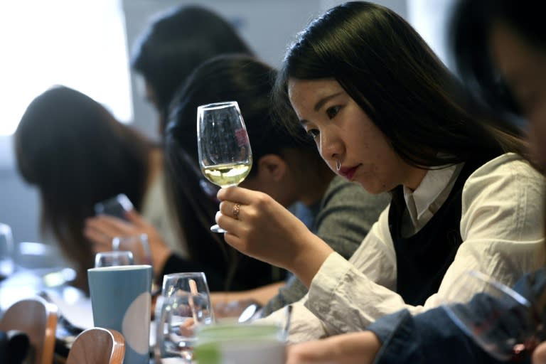 Chinese students attend a class at the School of Wine in Dijon, France