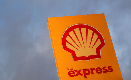 FILE PHOTO: The logo of Royal Dutch Shell is seen at a petrol station in Sint-Pieters-Leeuw, Belgium January 30, 2019. REUTERS/Yves Herman/File Photo