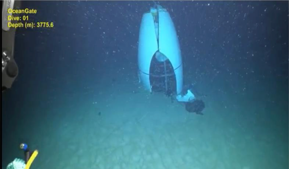 The Titan submersible was found on June 22, 2023, the seafloor after days of searching after it imploded. New photos show it on the ocean floor after it was discovered, and the lives of the five on board were lost on the way to the Titanic wreckage site. (ROV image of TITAN tail cone. Source: Pelagic Research Services, June 2023)