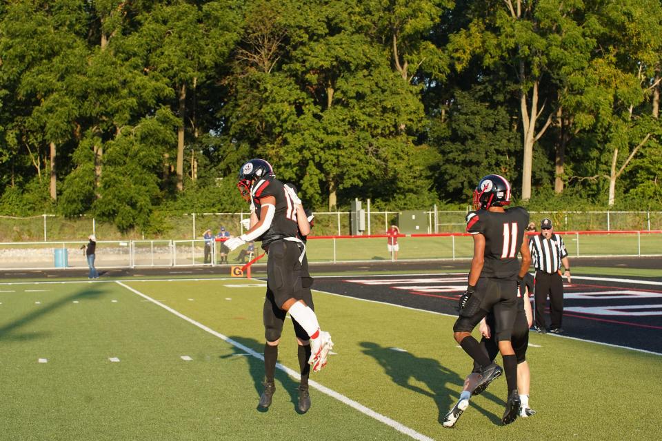 Marion Harding celebrates a big play against Mount Vernon to start the season.