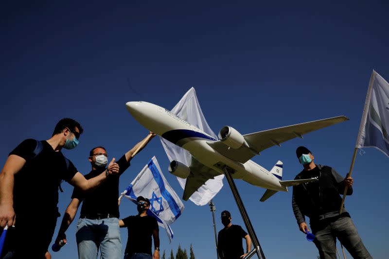 FILE PHOTO: Employees of Israeli flag carrier El Al Airlines take part in a protest asking for recovery plan for the cash-strapped airline that has been grounded due to the coronavirus disease (COVID-19) outbreak, near the Finance ministry in Jerusalem