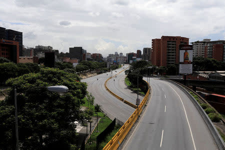 Caracas's main highway is seen empty during a strike called to protest against Venezuelan President Nicolas Maduro's government in Caracas, Venezuela, July 20, 2017. REUTERS/Marco Bello
