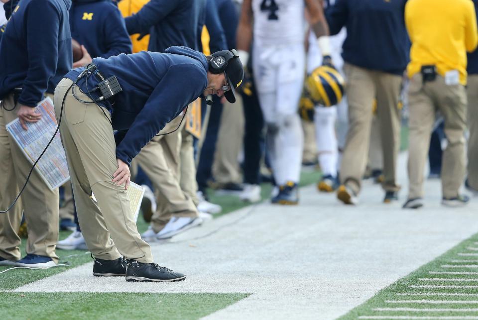 Michigan coach Jim Harbaugh reacts as time winds down in the 62-39 loss to Ohio State at Ohio Stadium, Nov. 24, 2018 in Columbus, Ohio.