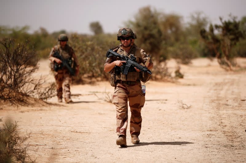 FILE PHOTO: French soldiers of the 2nd Foreign Engineer Regiment conduct an area control operation in the Gourma region during the Operation Barkhane in Ndaki