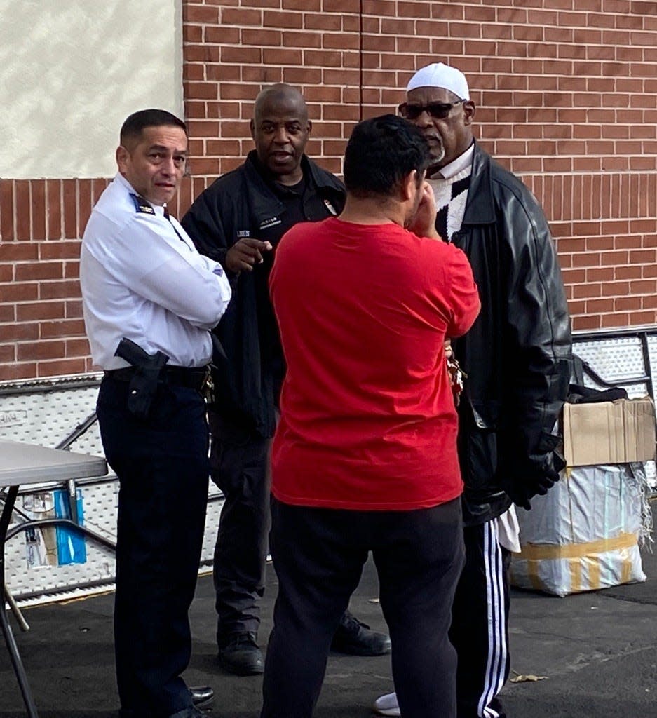 Providence's police chief, Col. Oscar Perez Jr., talked with people outside the Islamic Center of Rhode Island after a man was shot as he sold religious items in November 2023.