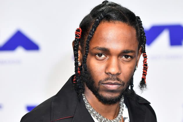 Kendrick Lamar's new album cover suggests he's a dad of 2
