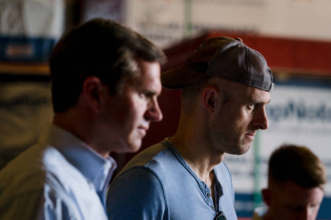 Eric Hyers, right, campaign manager for the Beshear campaign with Gov. Andy Beshear at the mayor’s office in Mayfield on May 9, 2023. (Photo by Kevin Lowery)