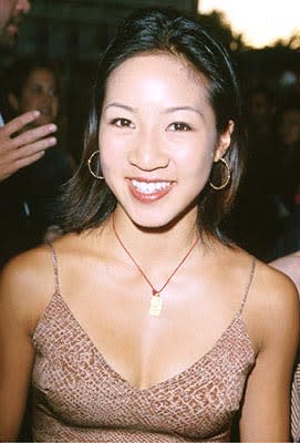 Michelle Kwan has a Cheez-It tied around her neck at the Loews Cineplex Century Plaza premiere of New Line's The Cell