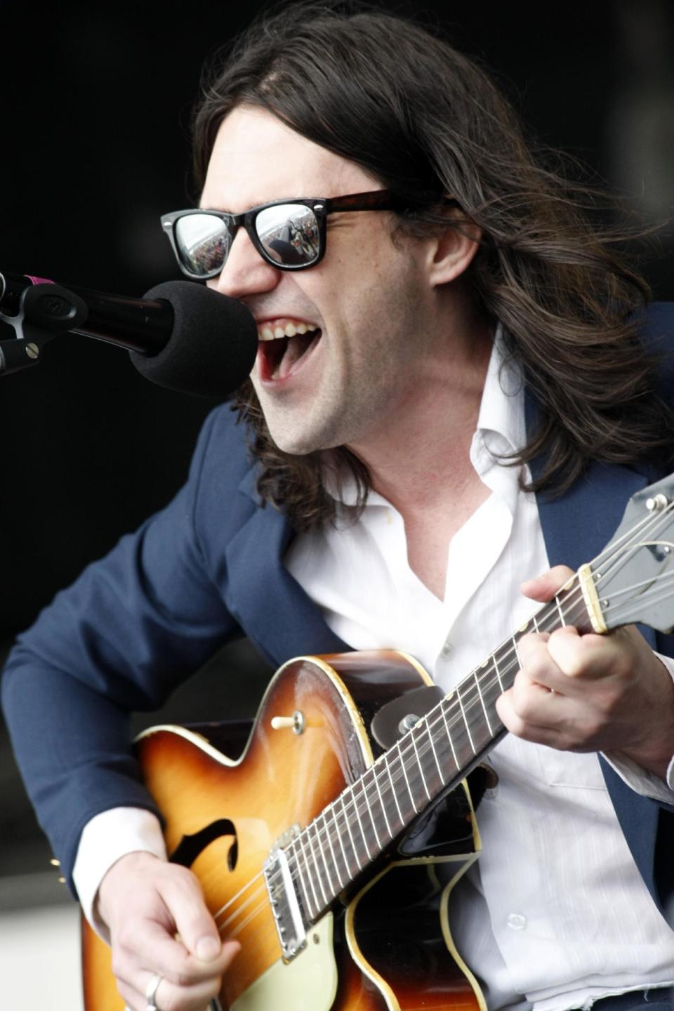 FILE - In this July 29, 2012 file photo, Conor Oberst performs at the Newport Folk Festival in Newport, R.I. Oberst has filed a libel lawsuit against a woman who made claims of sexual assault against the singer-songwriter. An attorney for Oberst filed the civil lawsuit Wednesday, Feb. 19, 2014, in New York federal court. (AP Photo/Joe Giblin, file)