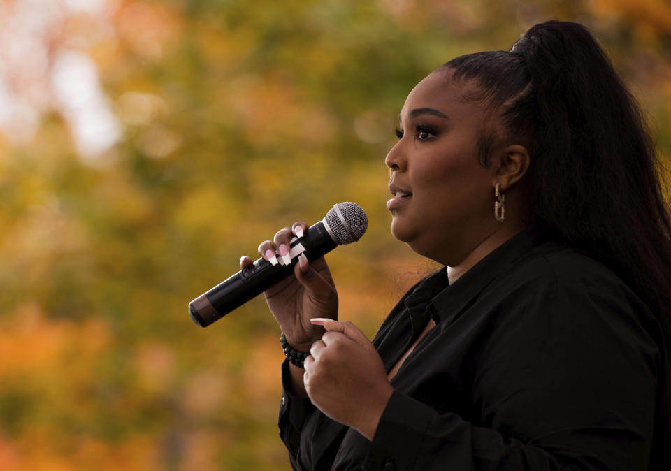 Lizzo speaks to the crowd while at a campaign event in Detroit for Democratic Presidential Candidate Joe Biden and Kamala Harris on Friday Oct. 23, 2020 in Detroit. (Nicole Hester/Ann Arbor News via AP)