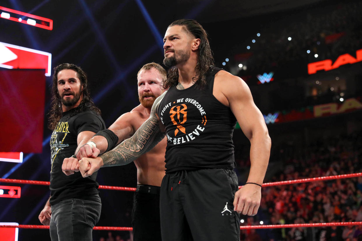 Shield members Seth Rollins, Dean Ambrose, and Roman Reigns reunite on an episode of "Monday Night Raw." (Photo courtesy of WWE)