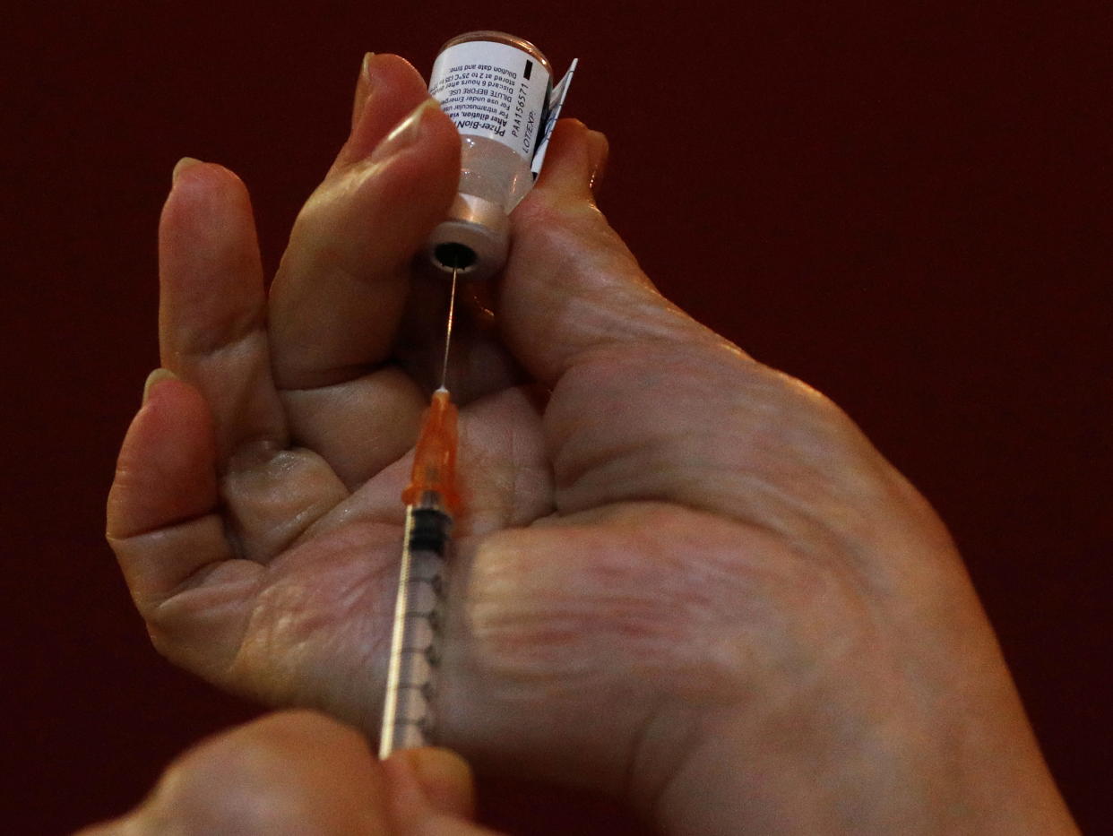 A nurse prepares to vaccinate healthcare workers at Gleneagles hospital, during the coronavirus disease (COVID-19) outbreak, in Singapore January 19, 2021. REUTERS/Edgar Su