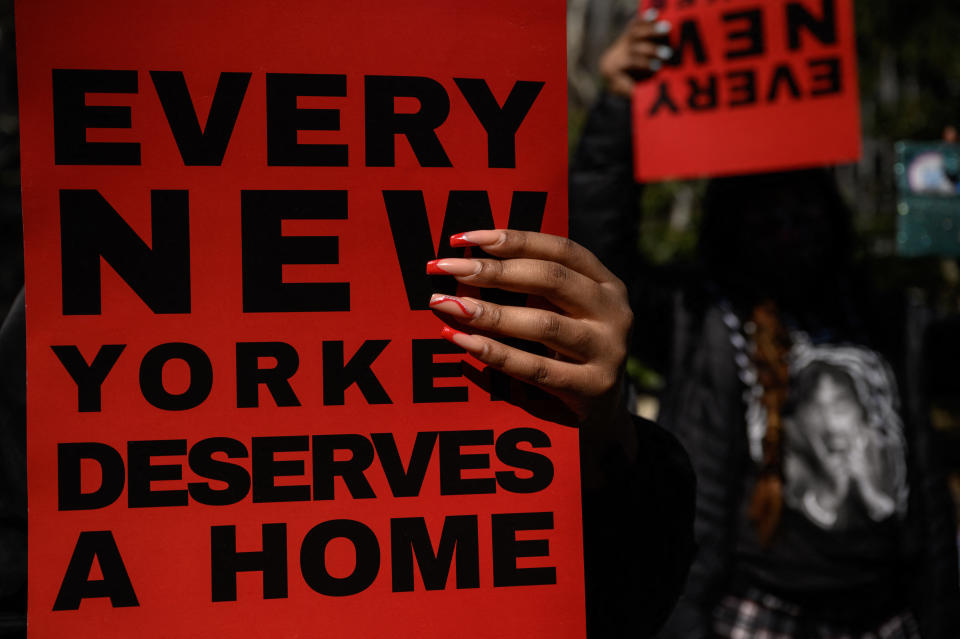 Activists, supporters, and members of the homeless community attend a protest calling for greater access to housing and better conditions at homeless shelters, outside City Hall in New York City on March 18, 2022. - (Photo by Ed JONES / AFP) (Photo by ED JONES/AFP via Getty Images)
