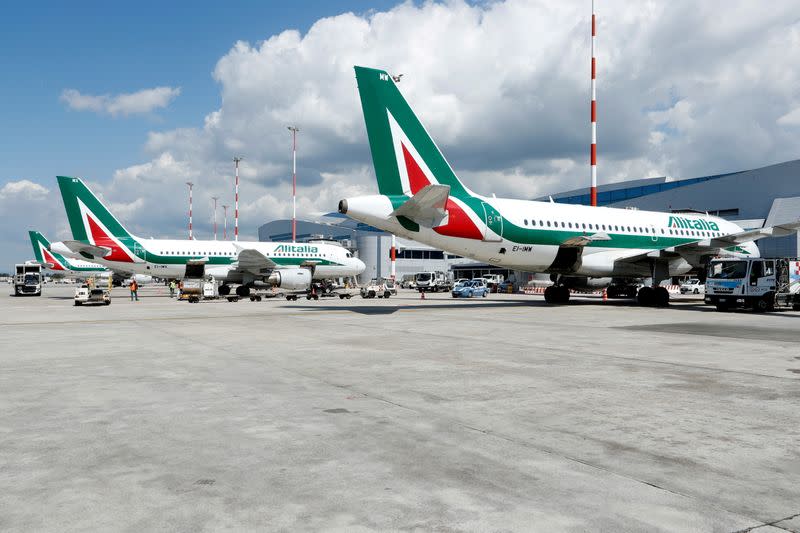 FILE PHOTO: Alitalia planes are seen on the tarmac at Fiumicino International Airport in Rome