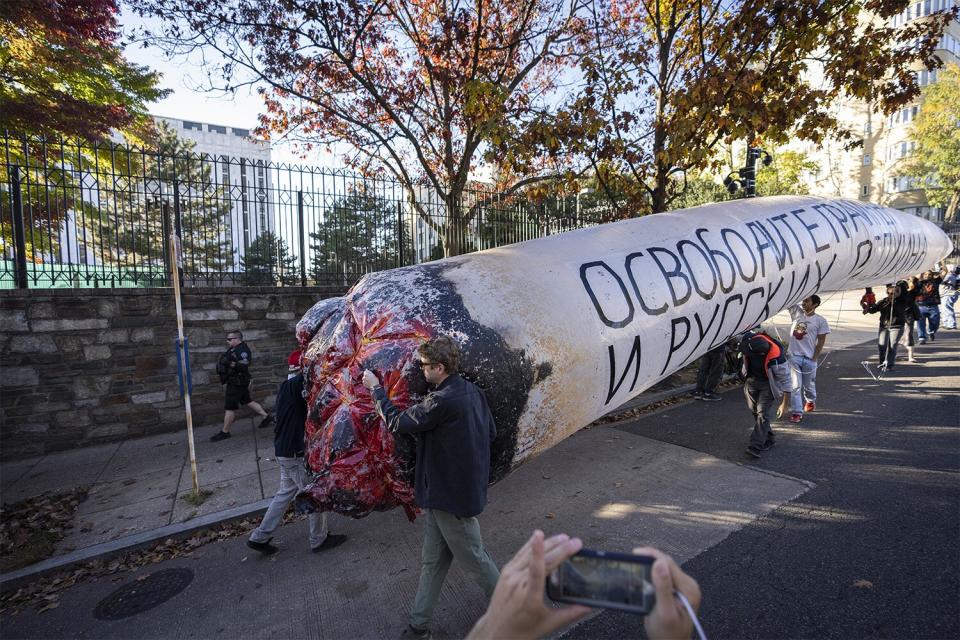 WASHINGTON, DC - OCTOBER 27: Cannabis advocates carry a fake inflatable joint outside the Russian Embassy to demand the release of American basketball star Brittney Griner, who has been imprisoned in Russia since February for cannabis possession, October 27, 2022 in Washington, DC. Earlier this week, a Russian appeals court upheld a nine-year prison sentence imposed on Griner. According to the Biden administration, Russia and the United States have been in frequent contact about a potential prisoner exchange involving Griner and others. (Photo by Drew Angerer/Getty Images)