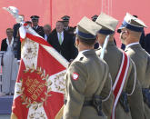 US Secretary of State Mike Pompeo, center, attends ceremonies commemorating the 100th anniversary of the Battle of Warsaw at the Pilsudski square in Warsaw, Poland, Saturday Aug. 15, 2020. Pompeo is on a five day visit to central Europe. (Janek Skarzynski/Pool via AP)