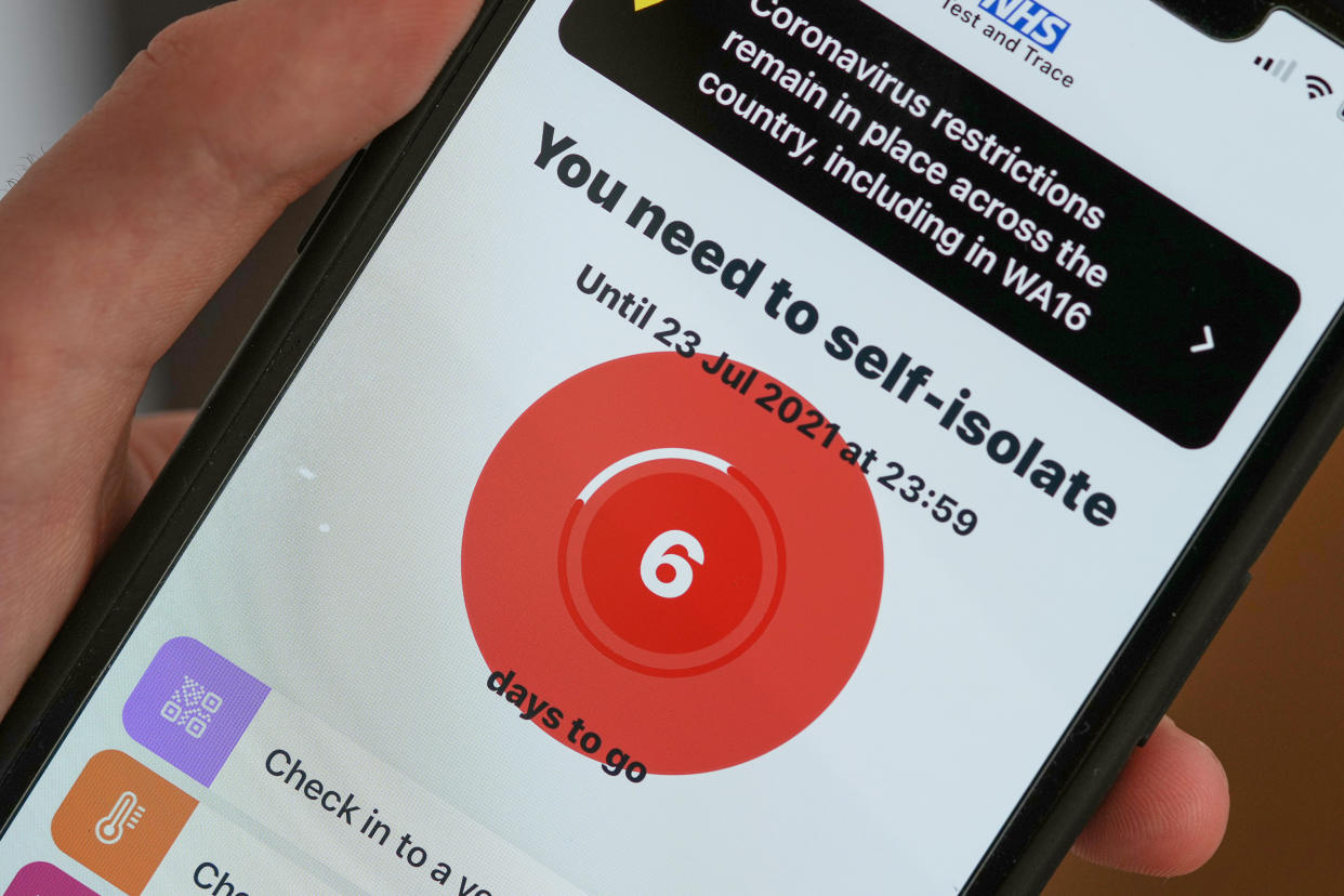 The NHS COVID-19 app alerts the user to isolate when they come in contact with someone who's tested positive. Photo: Christopher Furlong/Getty Images