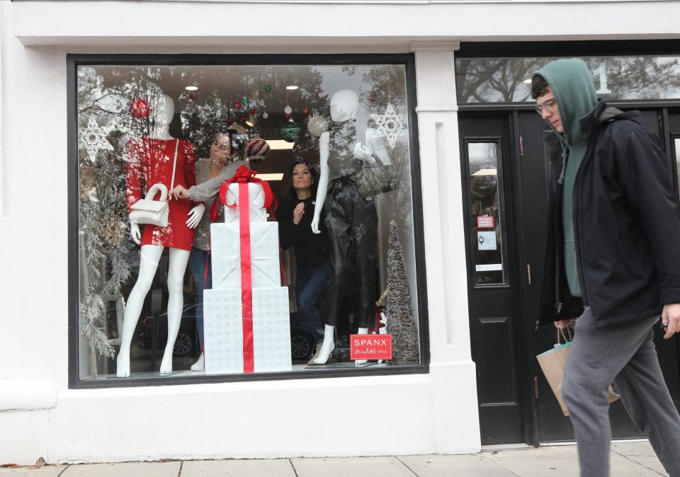 Carrie Turelli and Lucille Coyle, co-owners of Apricot Lane on East Ridgewood Ave. in the window of their store as some shoppers came out for Black Friday in downtown Ridgewood, NJ on November 27, 2021.