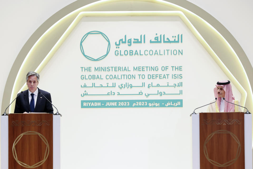 Secretary of State Antony Blinken, left, and Saudi Arabia's Foreign Minister Prince Faisal bin Farhan hold a joint news conference at the Intercontinental Hotel in Riyadh, Saudi Arabia, Thursday, June 8, 2023. (Ahmed Yosri/Pool Photo via AP)