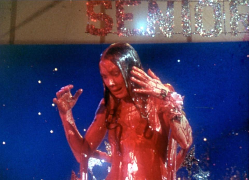 sissy spacek in a bloody prom dress in carrie