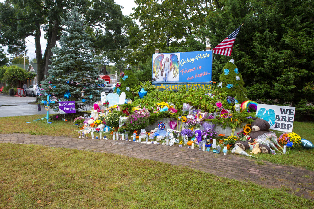 A memorial for Gabrielle "Gabby" Petito is seen in her hometown of Blue Point, New York. The FBI offered its final comments on the case Friday, stating that the only person identified as being involved in her homicide was her fiancé, Brian Laundrie. (AP Photo/Ted Shaffrey)