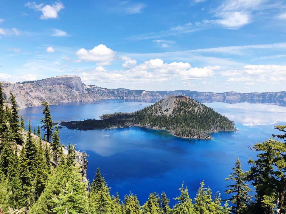 <p><a href="https://www.nps.gov/crla/index.htm" rel="nofollow noopener" target="_blank" data-ylk="slk:Crater Lake National Park;elm:context_link;itc:0;sec:content-canvas" class="link "><strong>Crater Lake National Park </strong></a></p><p>Nature can be kinda wild, and that's on display here. A volcano erupted almost 8,000 years ago and then caved in on itself, creating this beautiful, deep lake that is filled by rain and snow. Its sparkling color is magnificent in the sun.</p>