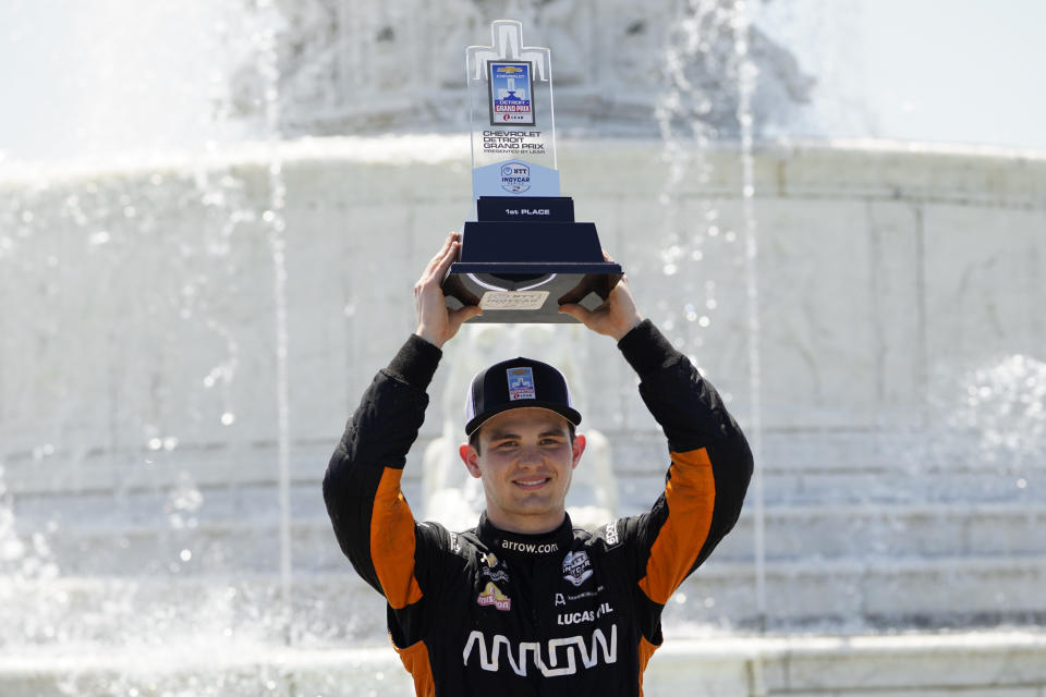 Pato O'Ward celebrates after winning the second race of the IndyCar Detroit Grand Prix auto racing doubleheader on Belle Isle in Detroit Sunday, June 13, 2021. (AP Photo/Paul Sancya)