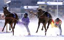 <p>Skijoring is a racing event in which skiers are towed across the ice and snow while hanging on to the reins of a horse. It appeared as a demonstration sport at the 1928 Winter Games in St. Moritz, Switzerland. (AP) </p>