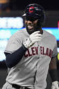 Cleveland Indians' Franmil Reyes smiles after crossing third base on his way home after his solo home run off Minnesota Twins pitcher Andrew Albers in the ninth inning of a baseball game, Wednesday, Sept. 15, 2021, in Minneapolis. The Indians won 12-3. (AP Photo/Jim Mone)