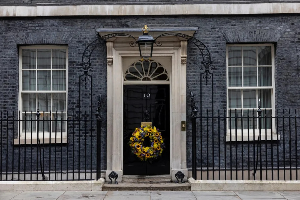 A Ukrainian themed Wreath to mark the one year anniversary of the Russian invasion of Ukraine sits on the door of 10 Downing Street. (Simon Dawson / No10 Downing Street)